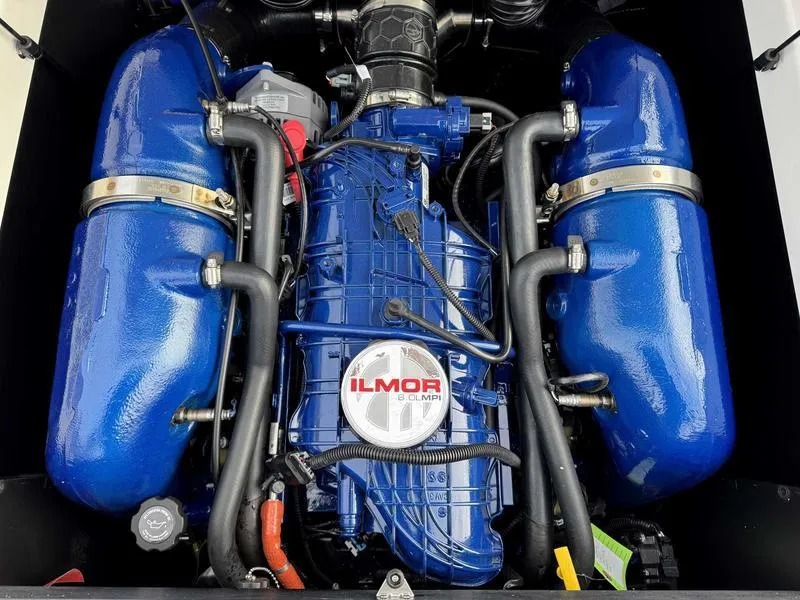 Slide: The Image of Ilmor 6.0L engine in 2025 MasterCraft NXT20 boat, featuring blue components. - 2