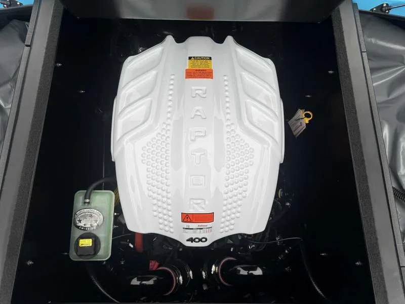 Slide: The Image of 2025 ATX Surf Boats 22 Type-S engine with Raptor 400 cover. - 15