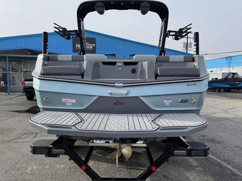 Slide: The Image of 2025 MasterCraft XT22 boat rear view at dealership. - 8