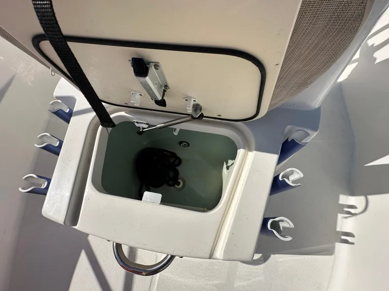 Slide: The Image of Open storage compartment on 2019 Boston Whaler 180 Dauntless boat. - 8