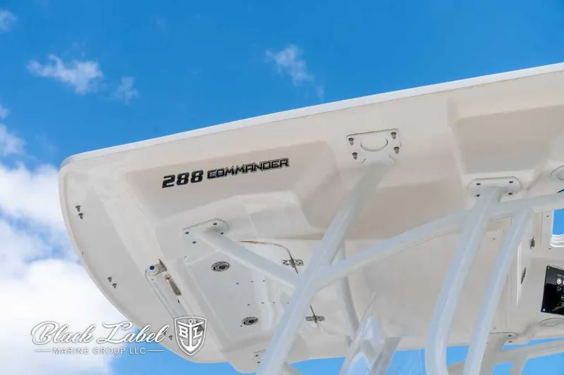 Slide: The Image of Sea Fox 288 Commander 2023 boat detail against blue sky. - 11
