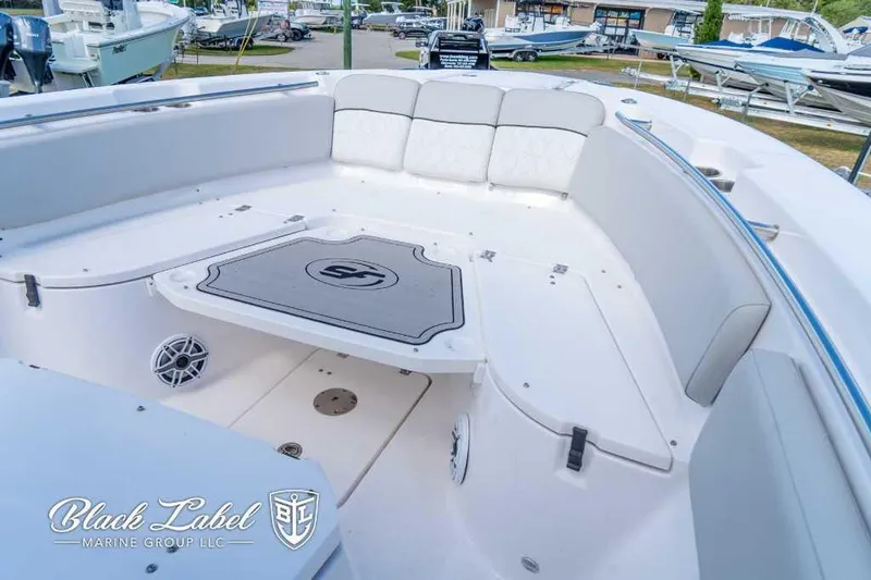 Slide: The Image of 2023 Sea Fox 288 Commander boat interior with spacious seating and sleek design. - 13