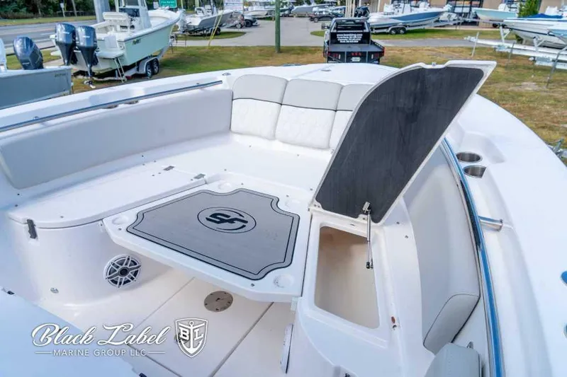 Slide: The Image of 2023 Sea Fox 288 Commander boat interior with storage compartment open. - 14