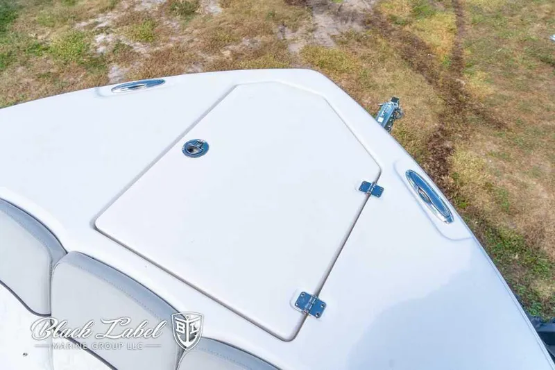 Slide: The Image of 2023 Sea Fox 288 Commander boat deck with storage hatch, viewed from above. - 15