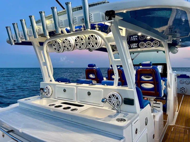 Slide: The Image of Luxury 2018 HCB 53 Suenos RXV boat interior with ocean view at sunset. - 9