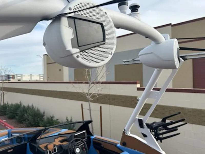 Slide: The Image of 2025 Axis T220 boat with advanced speaker system and sleek design. - 11