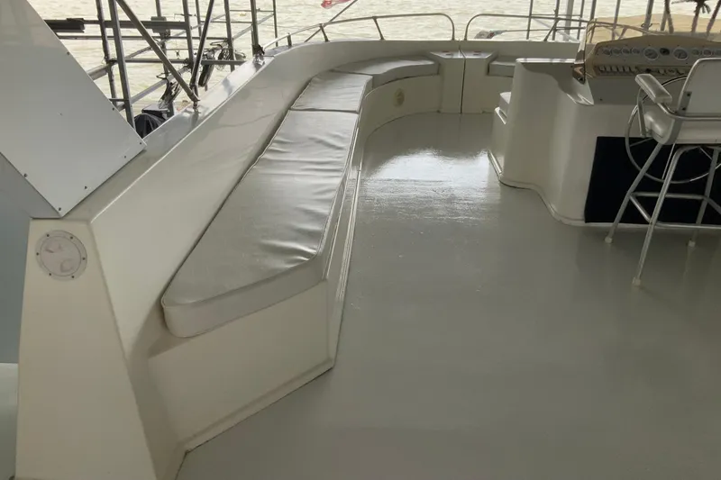Slide: The Image of 2004 Sumerset 18 x 87 houseboat deck with seating and helm station. - 10