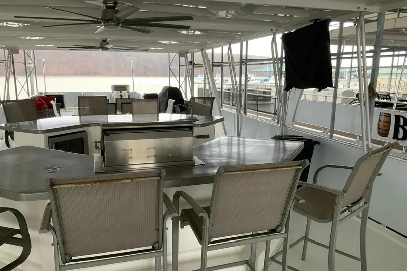 Slide: The Image of Spacious deck of 2004 Sumerset 18 x 87 houseboat with seating and grill. - 17