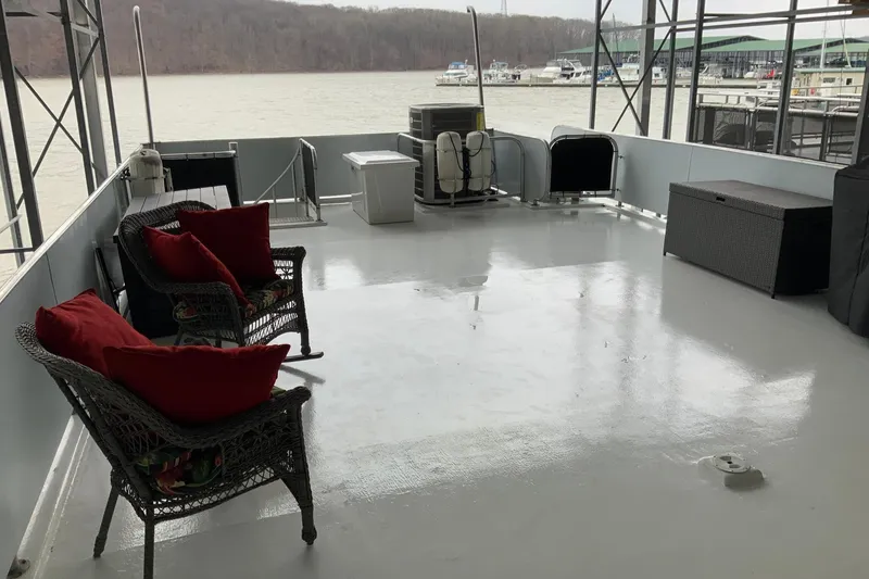 Slide: The Image of Spacious deck of 2004 Sumerset 18 x 87 houseboat with seating and scenic lake view. - 22