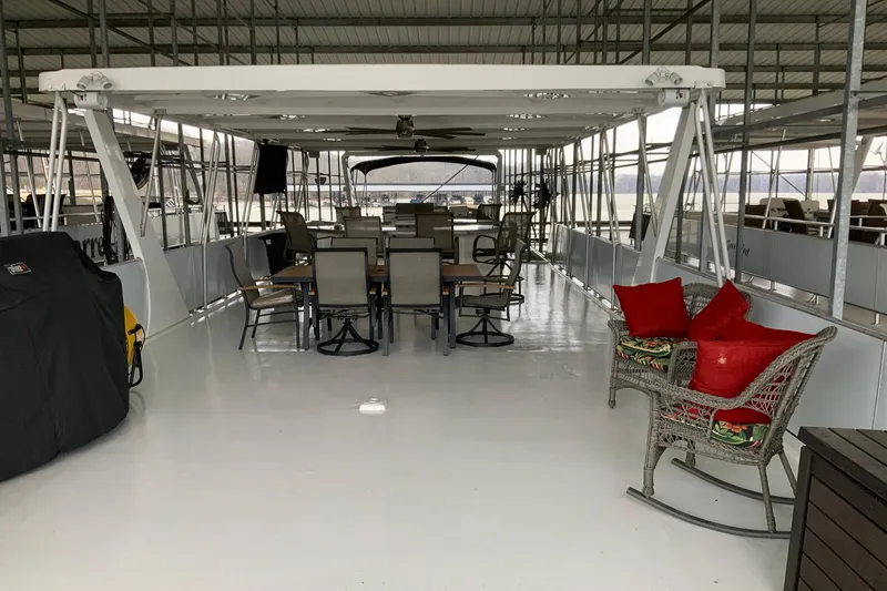 Slide: The Image of Spacious deck of 2004 Sumerset 18 x 87 houseboat with seating and dining area. - 26