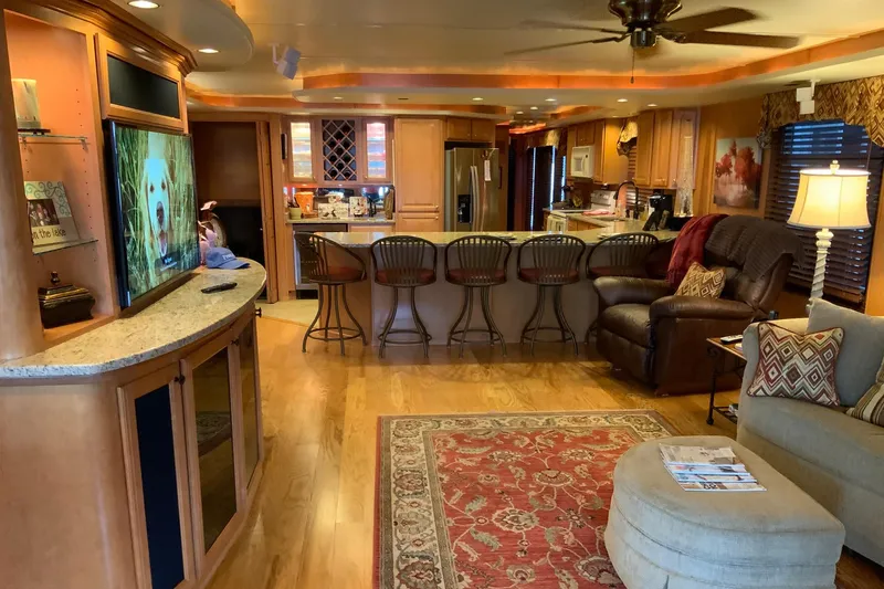 Slide: The Image of Luxurious 2004 Sumerset 18 x 87 houseboat interior with modern kitchen and cozy living area. - 28