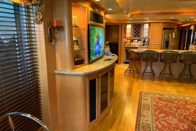 Slide: The Image of Luxurious 2004 Sumerset 18 x 87 houseboat interior with modern kitchen and entertainment area. - 29