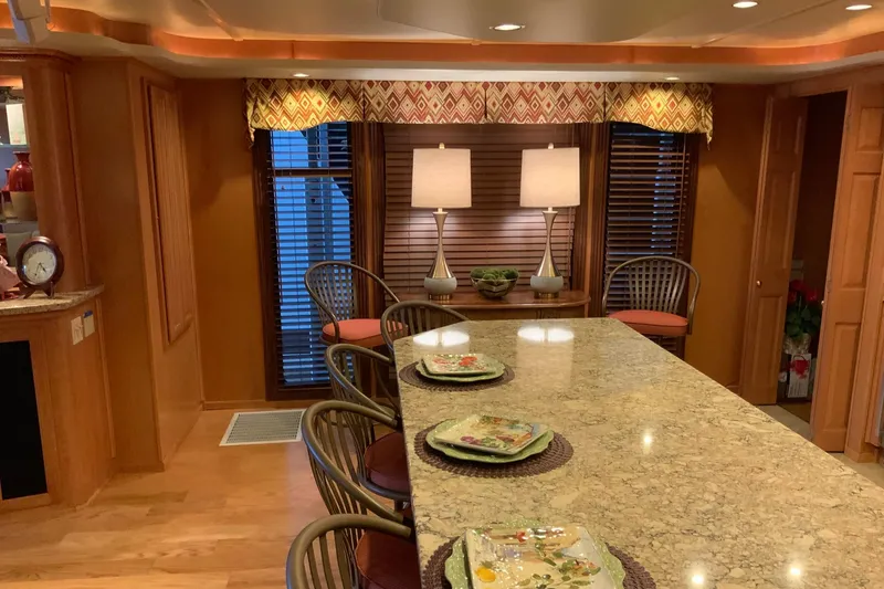 Slide: The Image of Luxurious 2004 Sumerset 18 x 87 houseboat interior with elegant dining area and granite countertop. - 35