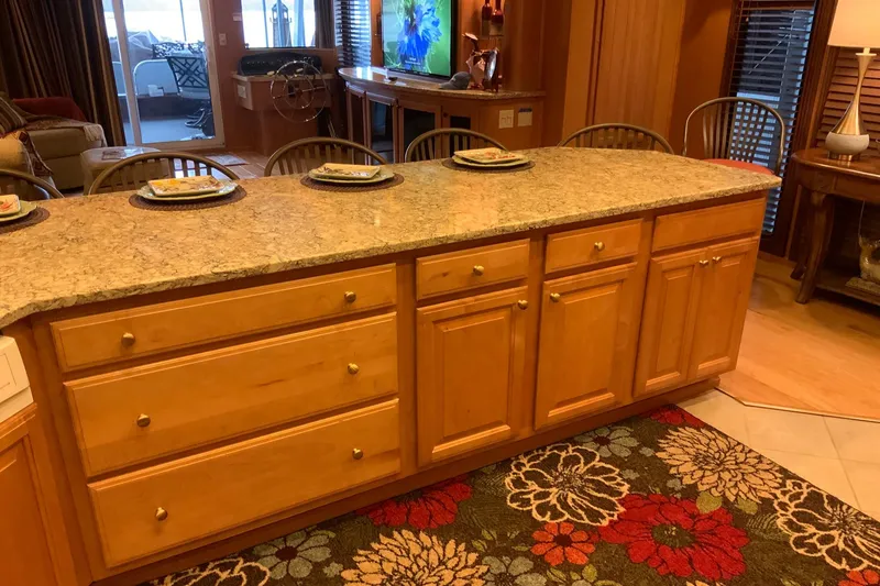Slide: The Image of Spacious kitchen island with granite countertop in 2004 Sumerset 18 x 87 houseboat. - 39