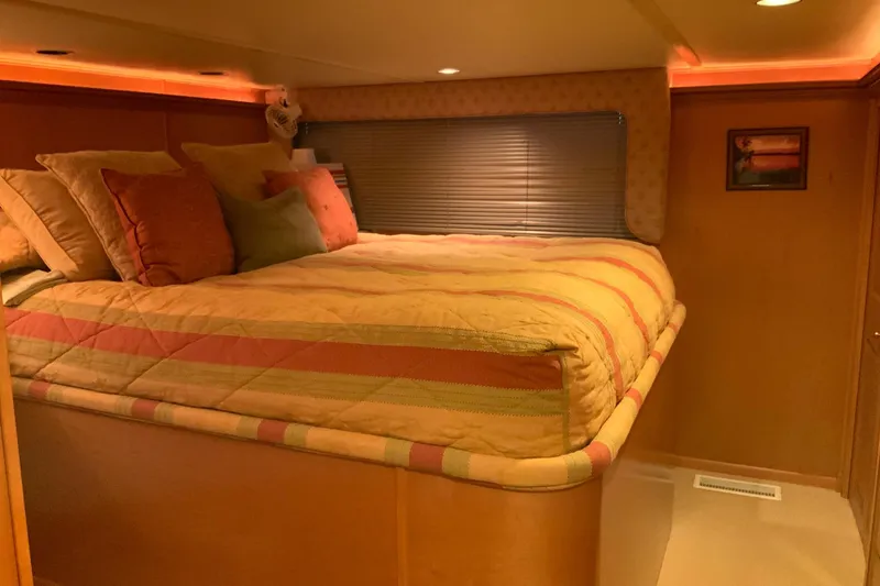 Slide: The Image of Luxurious bedroom interior of 2004 Sumerset 18 x 87 houseboat with cozy bedding. - 49
