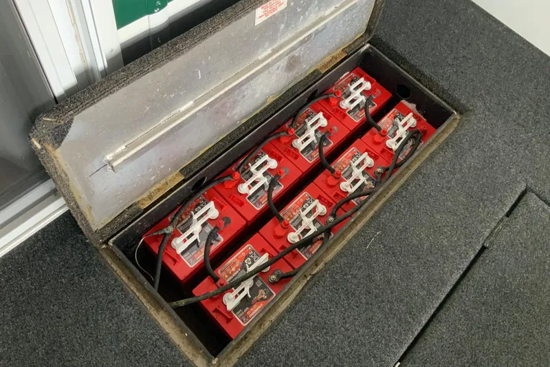 Slide: The Image of Red batteries in a Sumerset 18 x 87 houseboat, 2004 model. - 6