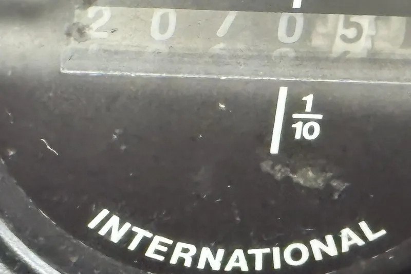 Slide: The Image of Close-up of an International odometer reading 20705, Sumerset 18 x 87, 2004 model. - 8