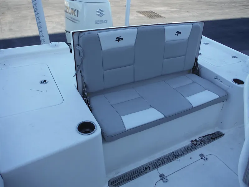 Slide: The Image of 2018 Sea Pro 248 Bay boat with gray seating and cup holders. - 15