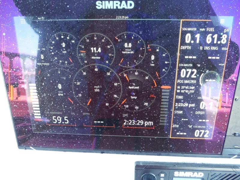Slide: The Image of Simrad display on 2018 Sea Pro 248 Bay showing speed, fuel, and navigation data. - 20
