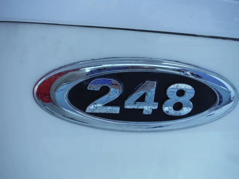 Slide: The Image of Chrome emblem of 2018 Sea Pro 248 Bay boat. - 26