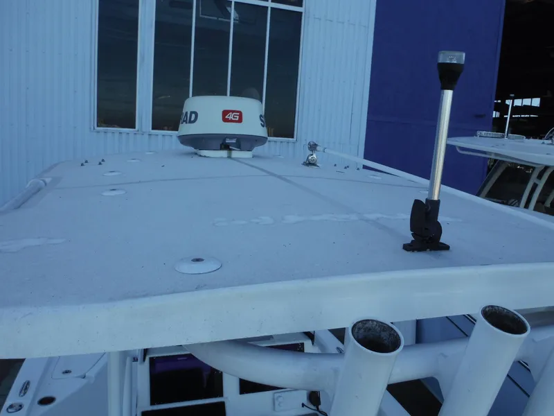 Slide: The Image of 2018 Sea Pro 248 Bay boat roof with radar and antenna. - 28