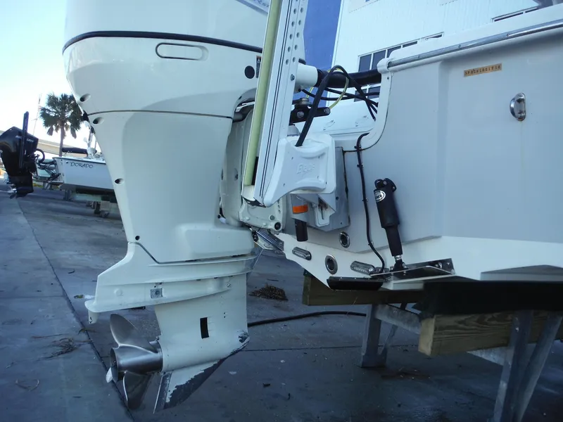 Slide: The Image of 2018 Sea Pro 248 Bay boat engine and stern view. - 34