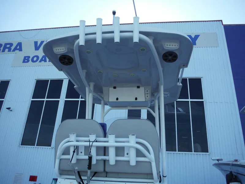 Slide: The Image of 2018 Sea Pro 248 Bay boat with T-top and rod holders. - 36