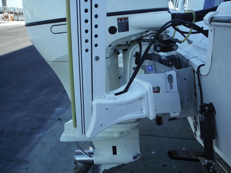 Slide: The Image of Close-up of 2018 Sea Pro 248 Bay boat engine and mounting details. - 6