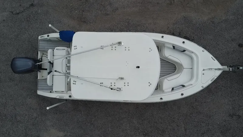 Slide: The Image of Aerial view of 2015 Century 2301 boat on gravel surface. - 1