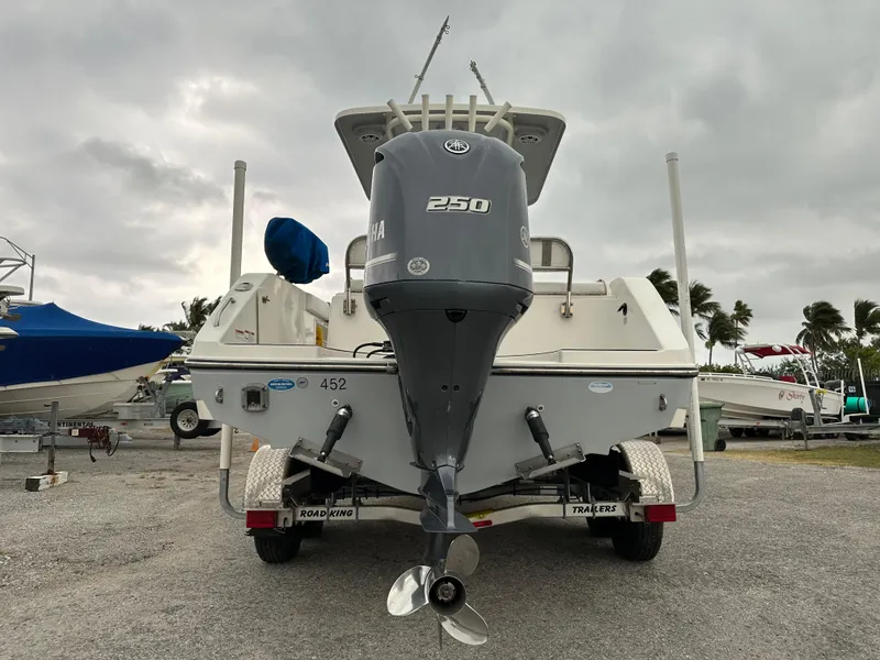 Slide: The Image of 2015 Century 2301 boat with Yamaha 250 engine on trailer. - 17