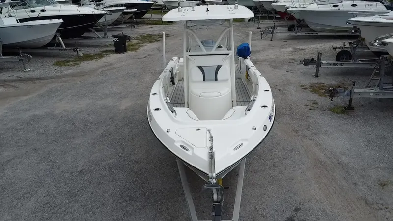 Slide: The Image of 2015 Century 2301 boat in storage yard, surrounded by other vessels. - 2