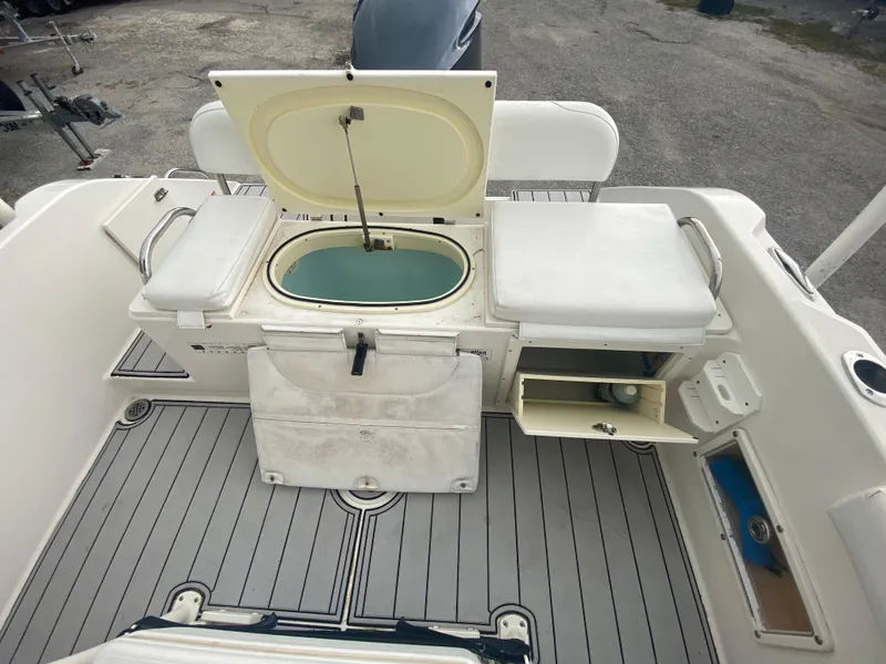 Slide: The Image of 2015 Century 2301 boat interior with open storage compartments and seating. - 20