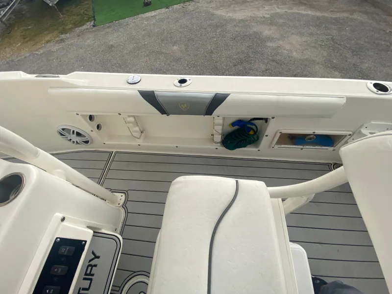 Slide: The Image of Century 2301 boat interior, 2015 model, featuring seating and storage compartments. - 29