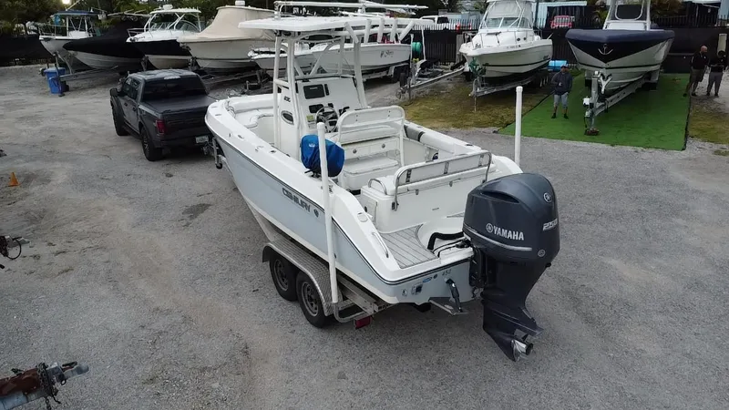 Slide: The Image of Century 2301 boat from 2015 with Yamaha engine in a boatyard. - 5