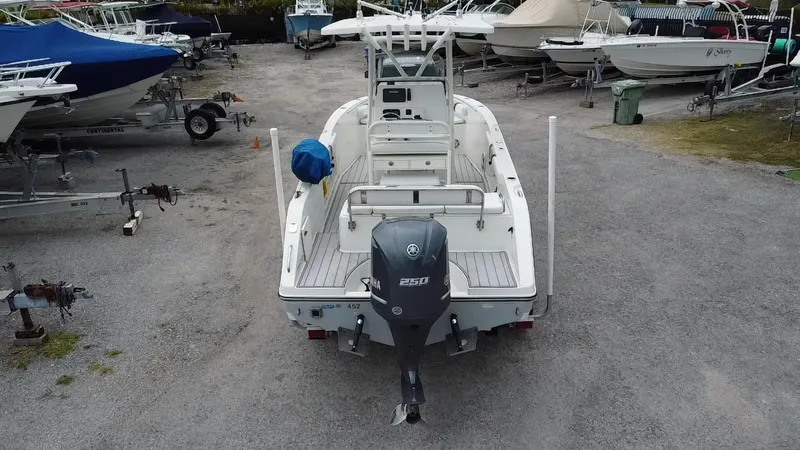 Slide: The Image of 2015 Century 2301 boat with Yamaha engine in a boatyard. - 6