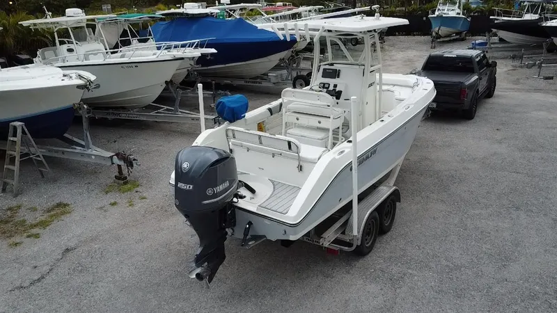 Slide: The Image of 2015 Century 2301 boat on trailer with Yamaha outboard motor. - 7
