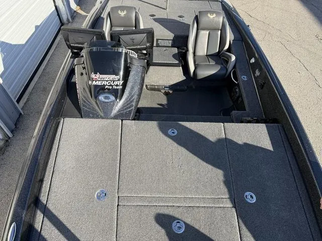 Slide: The Image of 2022 Phoenix 721 Pro XP boat interior with dual seats and control panel. - 11