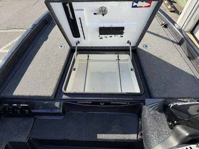 Slide: The Image of 2022 Phoenix 721 Pro XP boat storage compartment open, showcasing interior space and organization. - 14