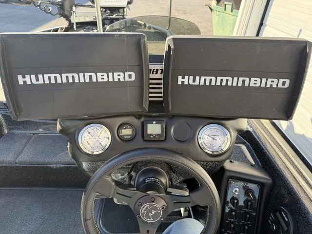 Slide: The Image of 2022 Phoenix 721 Pro XP boat dashboard with dual Humminbird displays. - 18