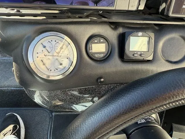 Slide: The Image of Dashboard of 2022 Phoenix 721 Pro XP boat with gauges and controls. - 20