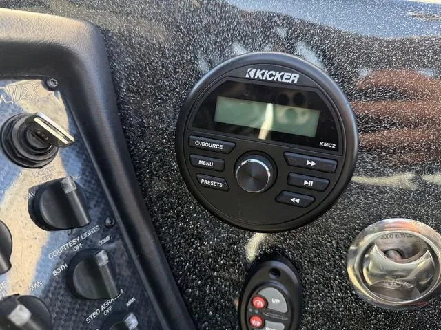 Slide: The Image of 2022 Phoenix 721 Pro XP dashboard with Kicker KMC2 audio system. - 22