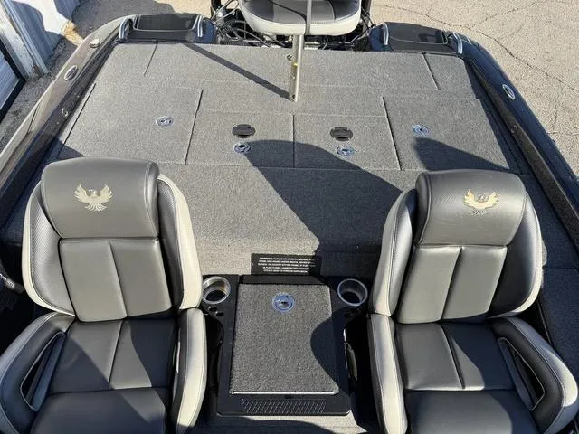 Slide: The Image of 2022 Phoenix 721 Pro XP boat interior with dual seats and storage compartments. - 23