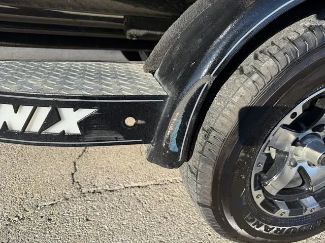 Slide: The Image of Close-up of 2022 Phoenix 721 Pro XP trailer tire and step detail. - 29