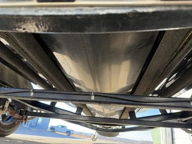 Slide: The Image of Underside view of 2022 Phoenix 721 Pro XP boat on trailer. - 31