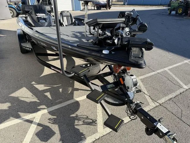 Slide: The Image of 2022 Phoenix 721 Pro XP fishing boat on trailer in parking lot. - 6