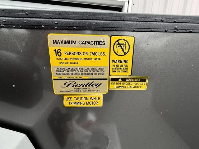 Slide: The Image of 2025 Bentley Pontoons Legacy 243 Navigator capacity label, 16 persons or 2740 lbs. - 16