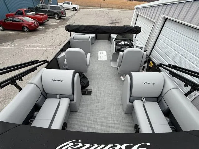 Slide: The Image of 2025 Bentley Pontoons Legacy 243 Navigator with spacious seating and modern design. - 23