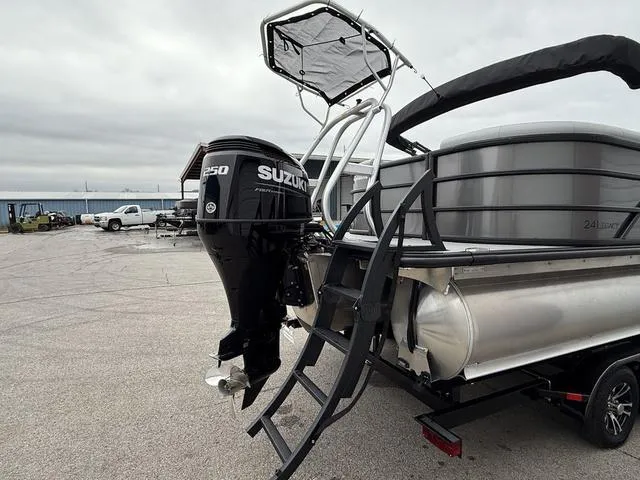 Slide: The Image of 2025 Bentley Pontoons Legacy 243 Navigator with Suzuki 250 outboard motor. - 4