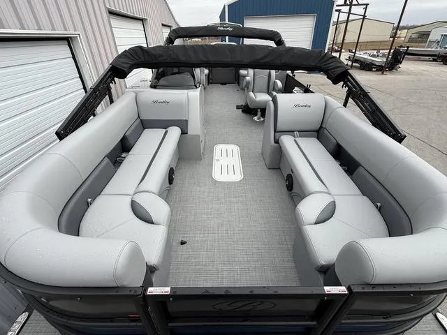 Slide: The Image of 2025 Bentley Pontoons Legacy 243 Navigator with spacious seating and sleek design. - 8