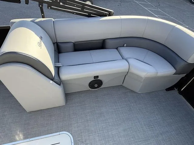 Slide: The Image of 2025 Bentley Pontoons Legacy 223 Navigator interior seating, featuring luxurious gray upholstery. - 10